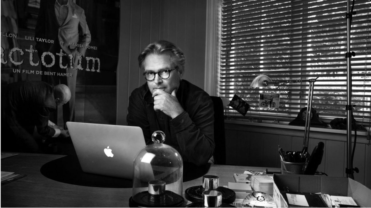 Bent at his office