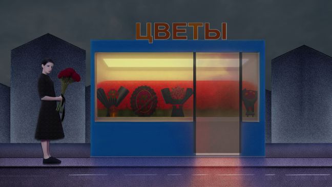 Eine Frau mit roten Blumen steht nachts vor dem Blumenladen