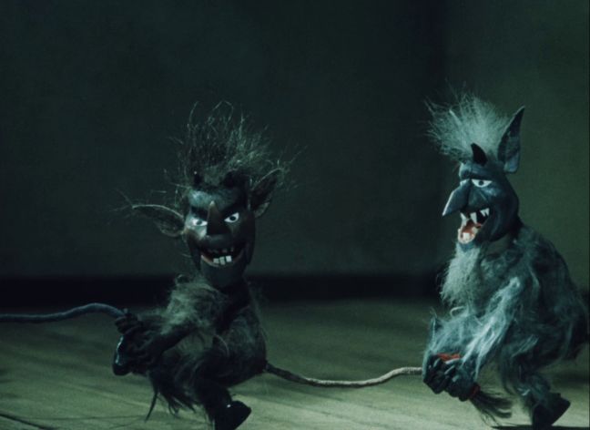 Zwei Teufelchen lächeln hämisch in die Kamera