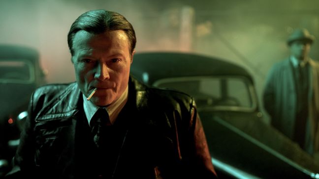 Arno Anthoni (Kari Hietalahti), head of the Finnish State Police, savours his triumph as Jewish refugees are forcibly deported.