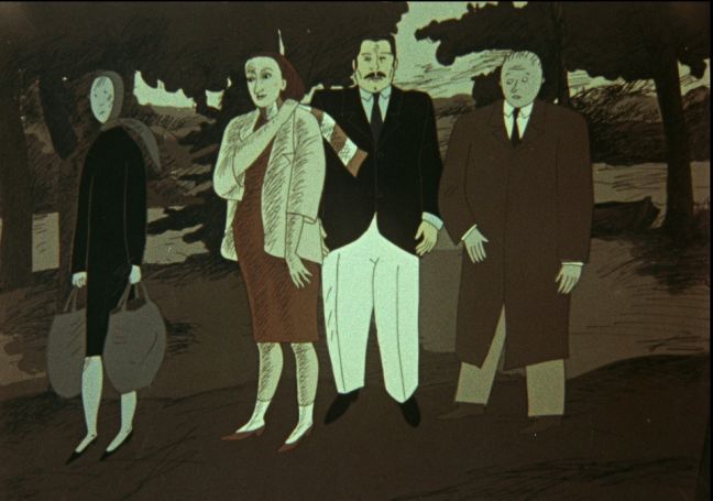 Vier Menschen stehen im Park