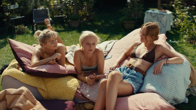 Main protagonists sitting in the sun