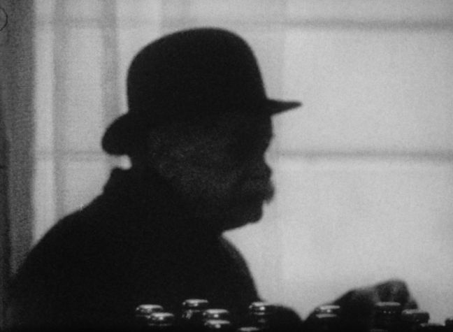 Schatten eines Mannes mit Schnurrbart und Hut