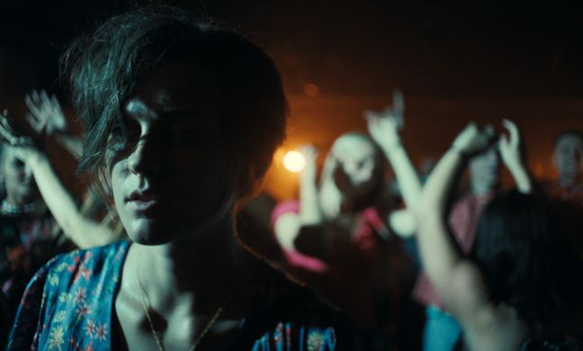 Laura in the club, dancing people