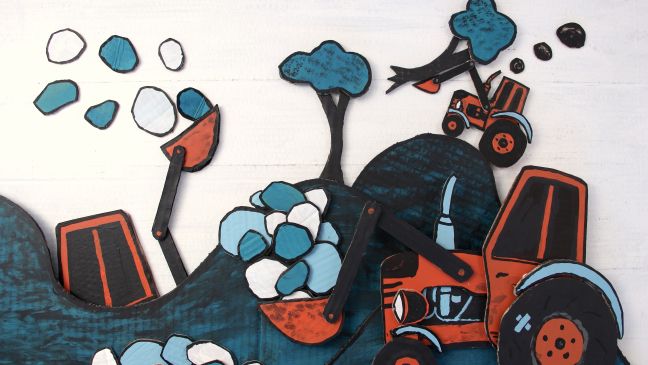 Bagger transportieren Bäume und Steine ab