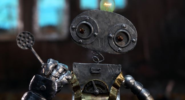 Robot Leo mit einem Löffel